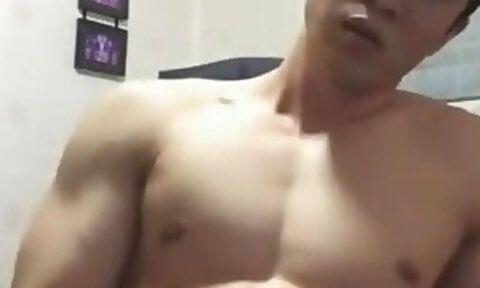 Korean guy showing his muscles and jerking off